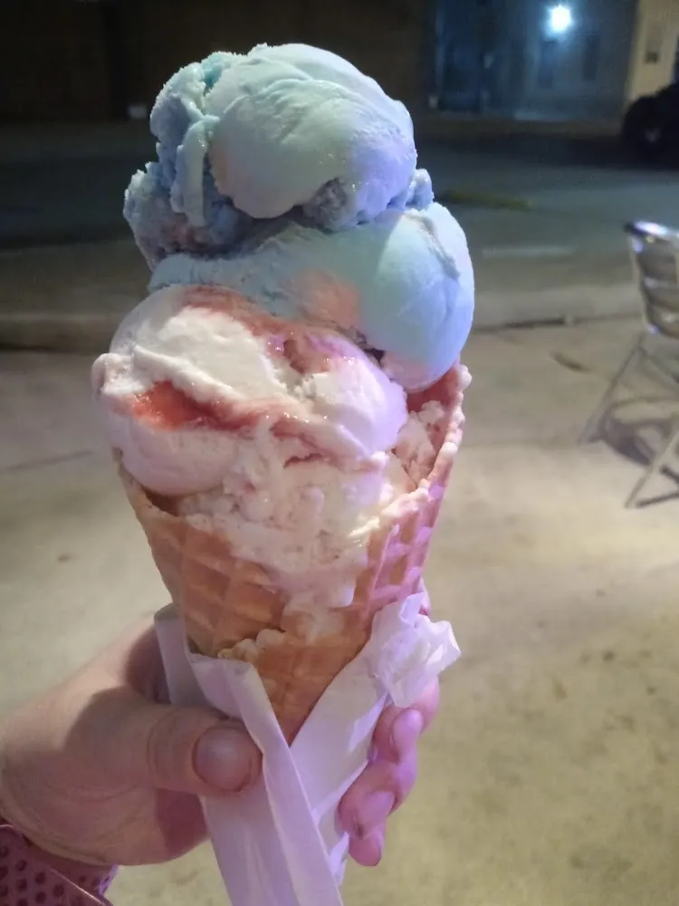 Strawberry Cheesecake and Cotton Candy Ice Cream in a Waffle Cone